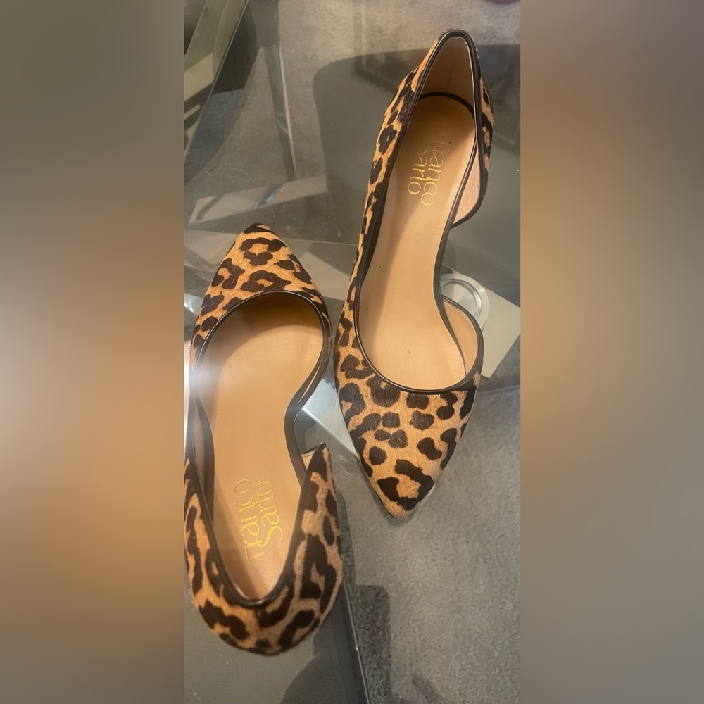 A pair of Franco Sarto leopard print wedges